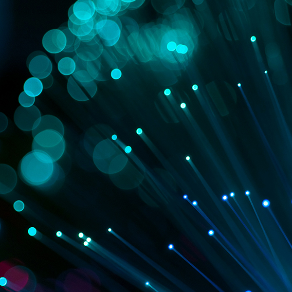 Fibre Optic wire closeup as part of a business telecoms set up